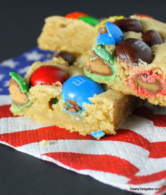 The BEST bar cookie blondie! M & M Peanut Butter Blondies pack will in lunch boxes and are great for football tailgates!