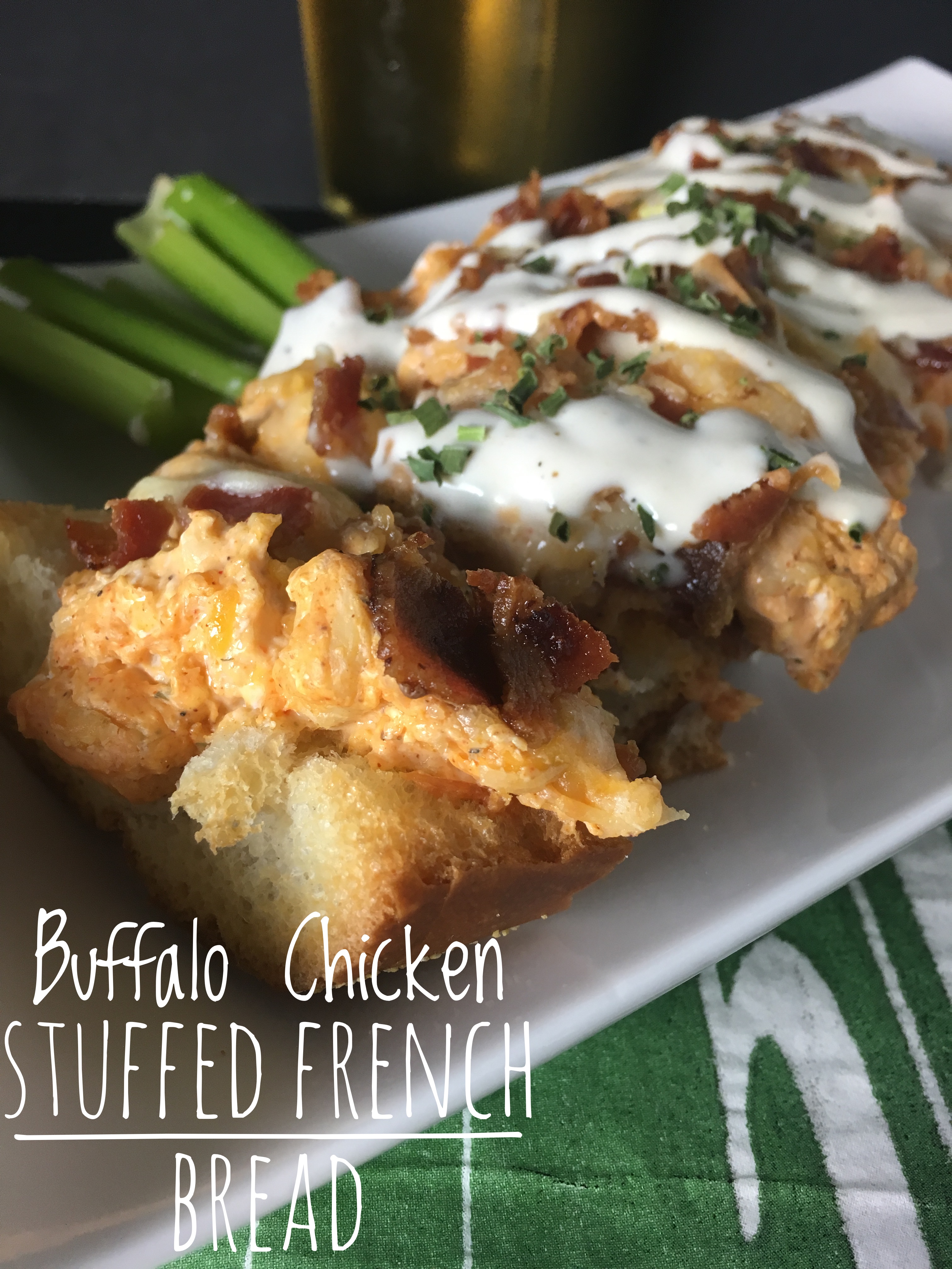 I want this now! Buffalo Chicken Stuffed French Bread is a game day crowd pleaser!